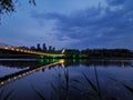 The reflection of the pontoon and pontoon in the water at night forms a beautiful pictureÃ¯Â¼Ë2Ã¯Â¼â°.